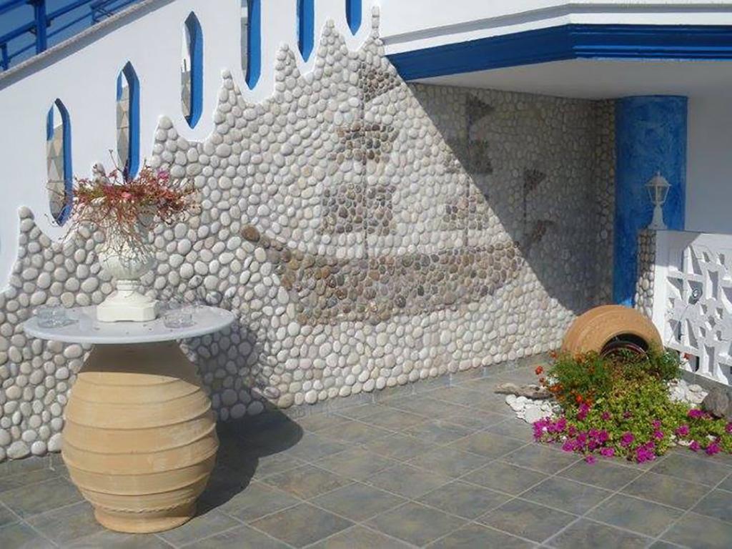 Gogas Palace Aparthotel Амудия Екстериор снимка